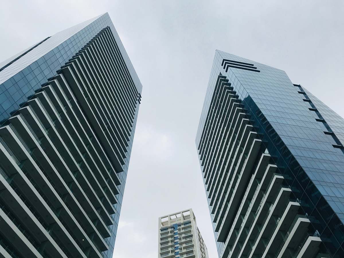 office building gray high-rise buildings during daytime high rise